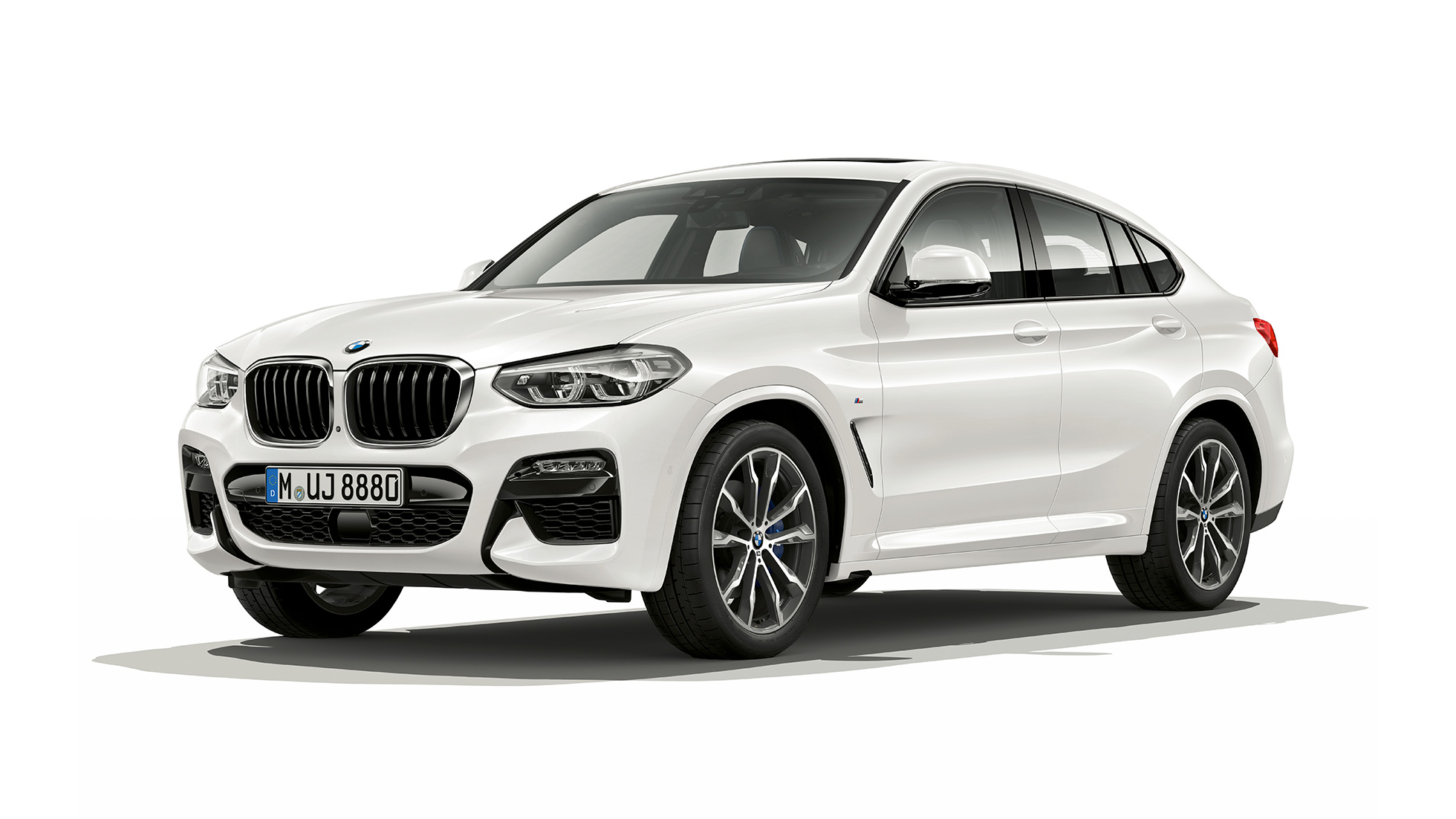 Vista frontal de tres cuartos del BMW X4 xDrive30i Modelo M Sport 2018 Alpine White